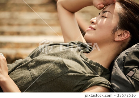 Track scrap line break woman backpacker 35572510