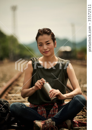 Woman backpacker portrait going track 35572511