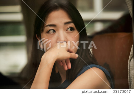 Female backpacker in the train Female backpacker in the train 35573047