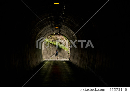 Female backpacker tunnel 35573146