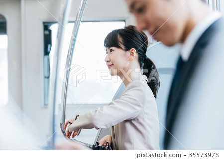 Train move business woman photography cooperation · Keio Electric Railway Co., Ltd. Train move business woman photography cooperation · Keio Electric Railway Co., Ltd. 35573978