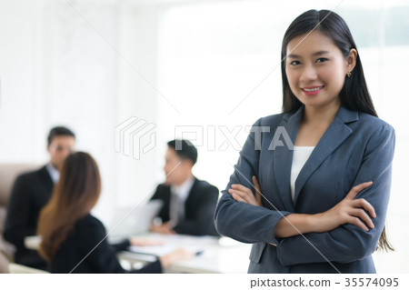Young Business woman on the background of business people 35574095