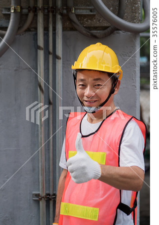 electrician or construction worker giving thumb up electrician or construction worker giving thumb up 35576005