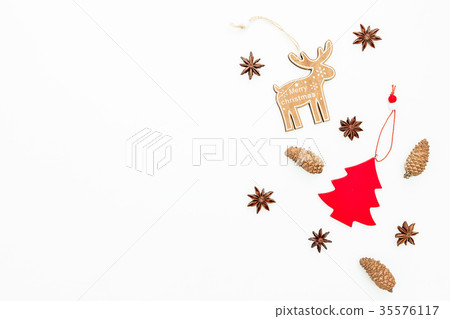 Christmas decoration and pine cones on white Christmas decoration and pine cones on white 35576117