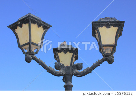 Old vintage metal street lamp Old vintage metal street lamp 35576132