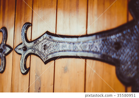 the wooden gate of the Church 35580951