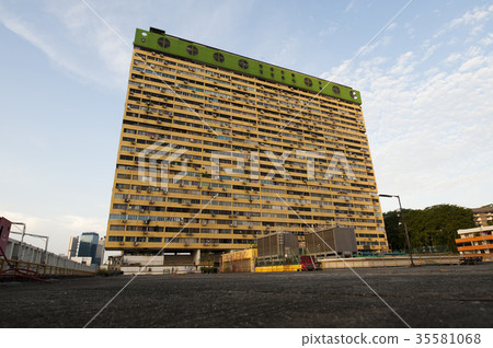 A view of a yellow building. A view of a yellow building. 35581068