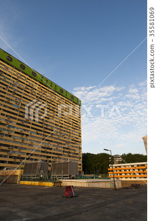 A view of a yellow building. A view of a yellow building. 35581069