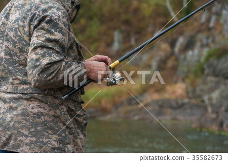 Fisherman at the Altai river Fisherman at the Altai river 35582673
