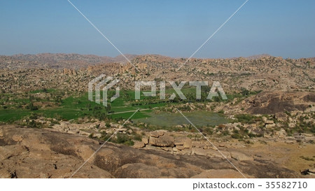 Granite mountains near Hampi, India. Granite mountains near Hampi, India. 35582710