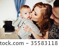 Christmas tree and happy family around 35583118