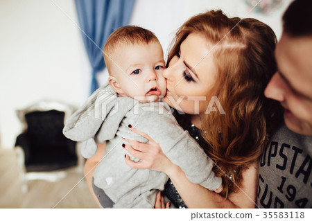 Christmas tree and happy family around 35583118