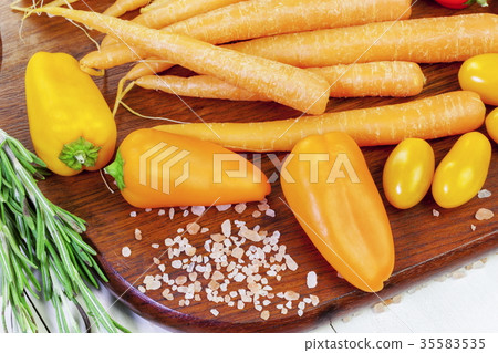 Various vegetables on the table with salt around Various vegetables on the table with salt around 35583535
