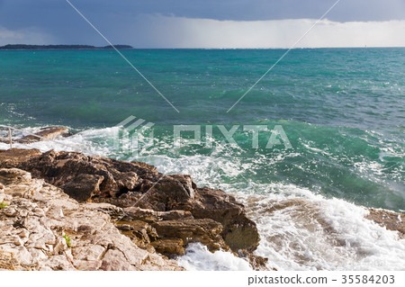 Stormy rocky beach in Istria, Croatia. 35584203