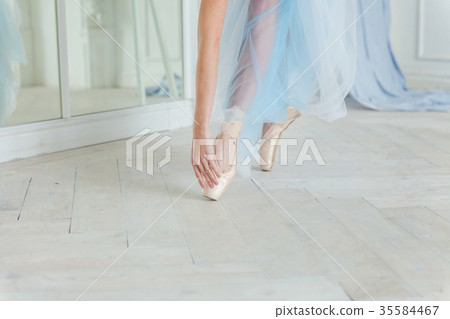 Ballerina puts pointe shoes Ballerina puts pointe shoes 35584467