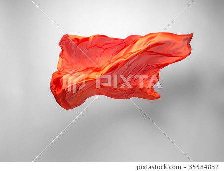 abstract orange fabric in motion 35584832