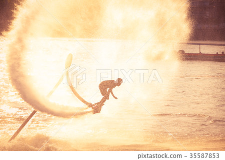 Silhouette and vintage color styl showing flyboard Silhouette and vintage color styl showing flyboard 35587853