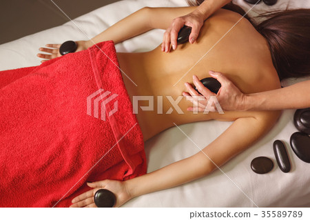Spa treatment. Hot Stone Massage 35589789
