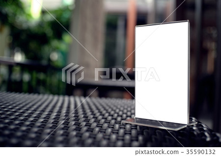 Mock up Menu frame standing on wood  35590132