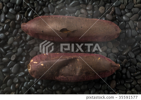 Stone baked potato Stone baked sweet potato japanese food Stone baked potato Stone baked sweet potato japanese food 35591577