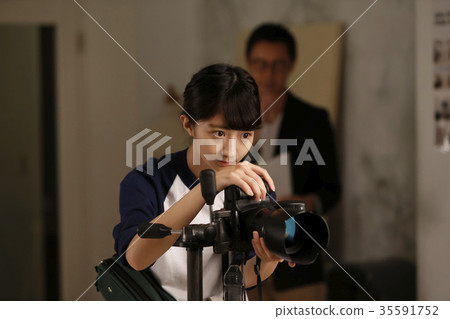 Photographer and assistant Photographer and assistant 35591752