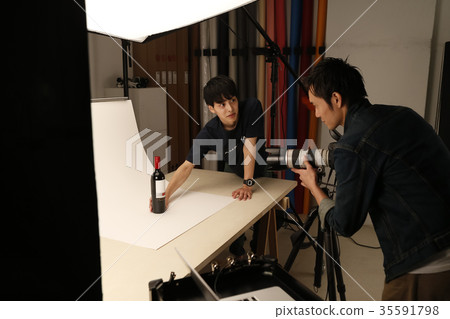 Photographer and assistant Photographer and assistant 35591798