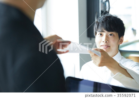 Working businessman Working businessman 35592071