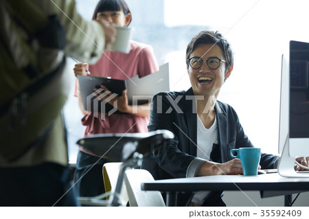 Working businessman Working businessman 35592409