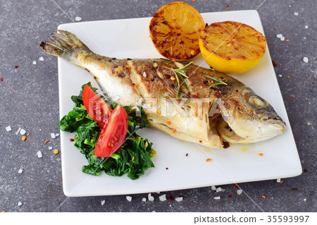 Grilled dorado with grilled , spinach and tomato Grilled dorado with grilled , spinach and tomato 35593997