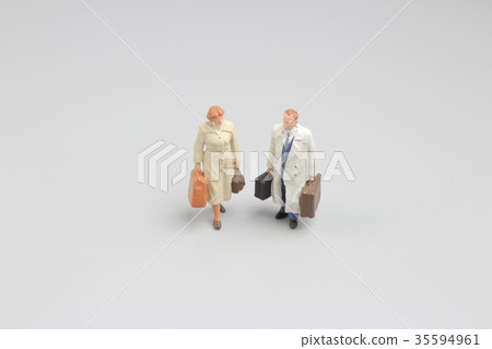 mini of figure on travel with luggage 35594961