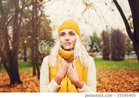 Pretty Autumn Woman with Yellow Cotton Scarf 35595403