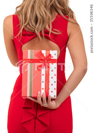 Portrait of casual young happy smiling woman hold 35596346