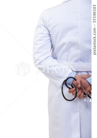 Young Doctor with a stethoscope in the hands Young Doctor with a stethoscope in the hands 35596383