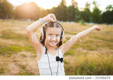 funny girl listening music and dancing funny girl listening music and dancing 35598879