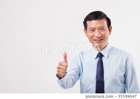 businessman pointing up thumb up gesture businessman pointing up thumb up gesture 35599047