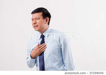 sick man suffering from acid reflux, heartburn sick man suffering from acid reflux, heartburn 35599048