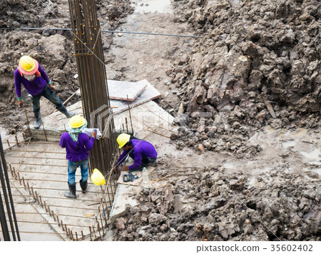 The worker is working on construction site The worker is working on construction site 35602402