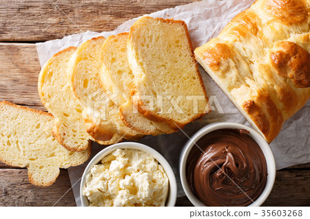 sliced brioche bread and mascarpone cheese 35603268
