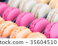Colorful french macaroon cake in the box. 35604510