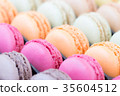 Colorful french macaroon cake in the box. 35604512