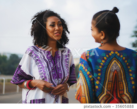 happy afro-american women friends communicates 35605888