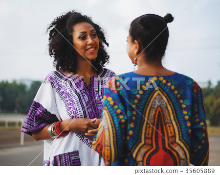 happy afro-american women friends communicates happy afro-american women friends communicates 35605889
