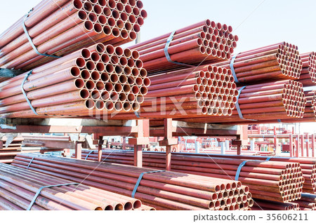 Stack of steel pipes for scaffolding in stock. Stack of steel pipes for scaffolding in stock. 35606211