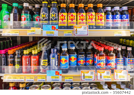 Energy drink section in a convenience store 35607442