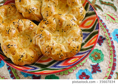uzbek bread on the wooden board uzbek bread on the wooden board 35607834
