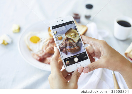 Young woman, cellphone, photo shoot 35608894