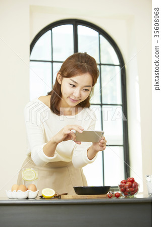 Young woman, cellphone, photo shoot 35608968