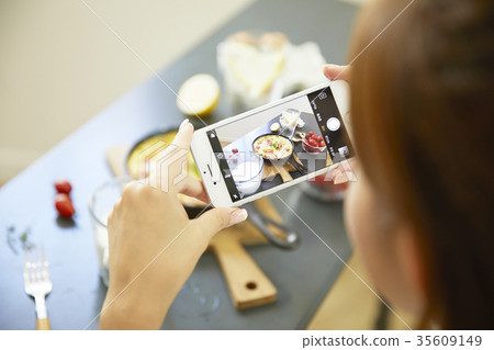 Young woman, cellphone, photo shoot 35609149
