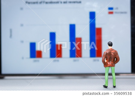 figures businessmen look at the graph 35609538