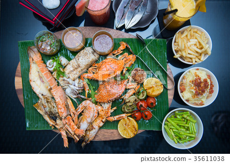 Mixed grilled seafood with side dishes Mixed grilled seafood with side dishes 35611038